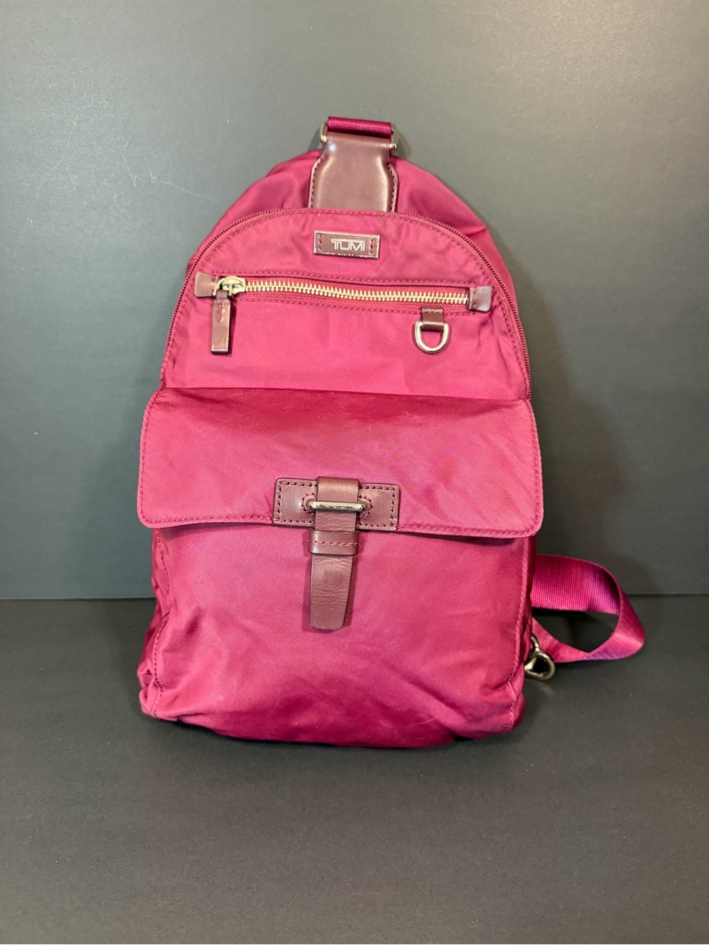 TUMI Burgundy Solid Backpack Adjustable Crossbody Strap Zip Buckle Silver sling